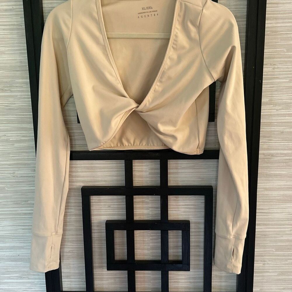 Agent 84 cream beige skin color twist front long sleeve cropped athletic top spo